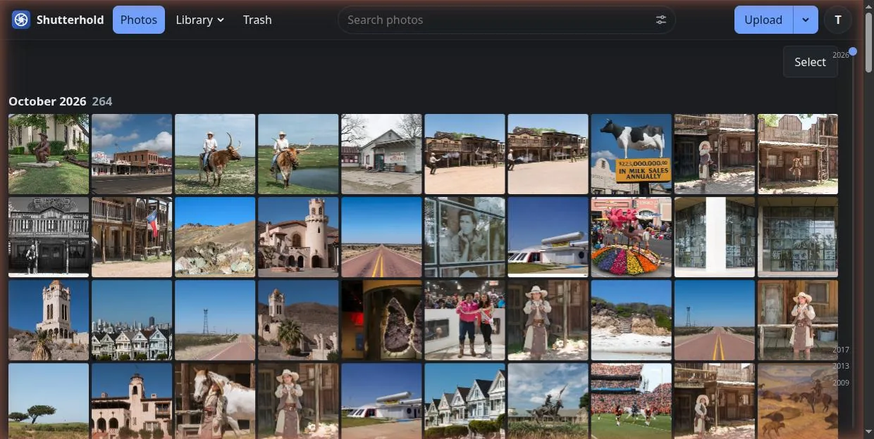 The Shutterhold timeline: a grid of photos grouped by month, with a scrubber of years down the right-hand side